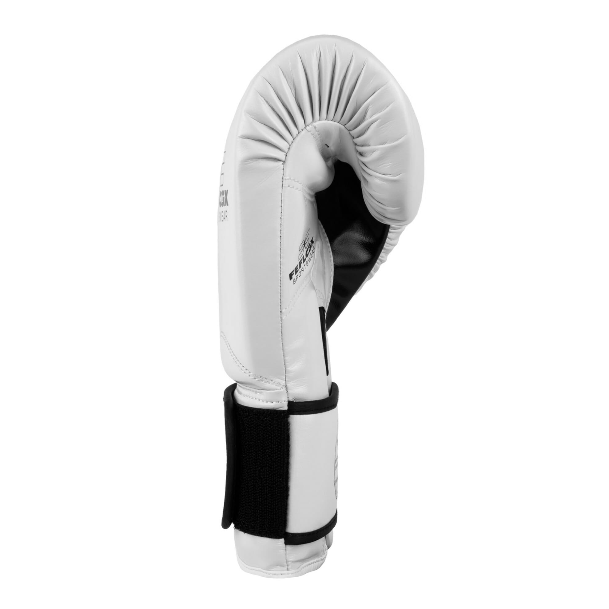 FFX Pro Boxhandschuhe Performance Striker von FEFLOGX Sportswear. Professionelle Kick Box Handschuhe, ultra hochwertig, Boxing-Gloves für max. Power, Kickbox Handschuhe, Muay Thai Handschuhe, Boxen Handschuhe Sparring, Boxsack-Handschuhe. Größen: 8oz, 10 oz, 12 oz, 14 oz, 16 oz. Farben: schwarz, rosa, olivgrün & weiß. Foto der Seite eines weißen Boxhandschuhs (1). FFX High-Level Multi Mundschutz Pro Fight Performance