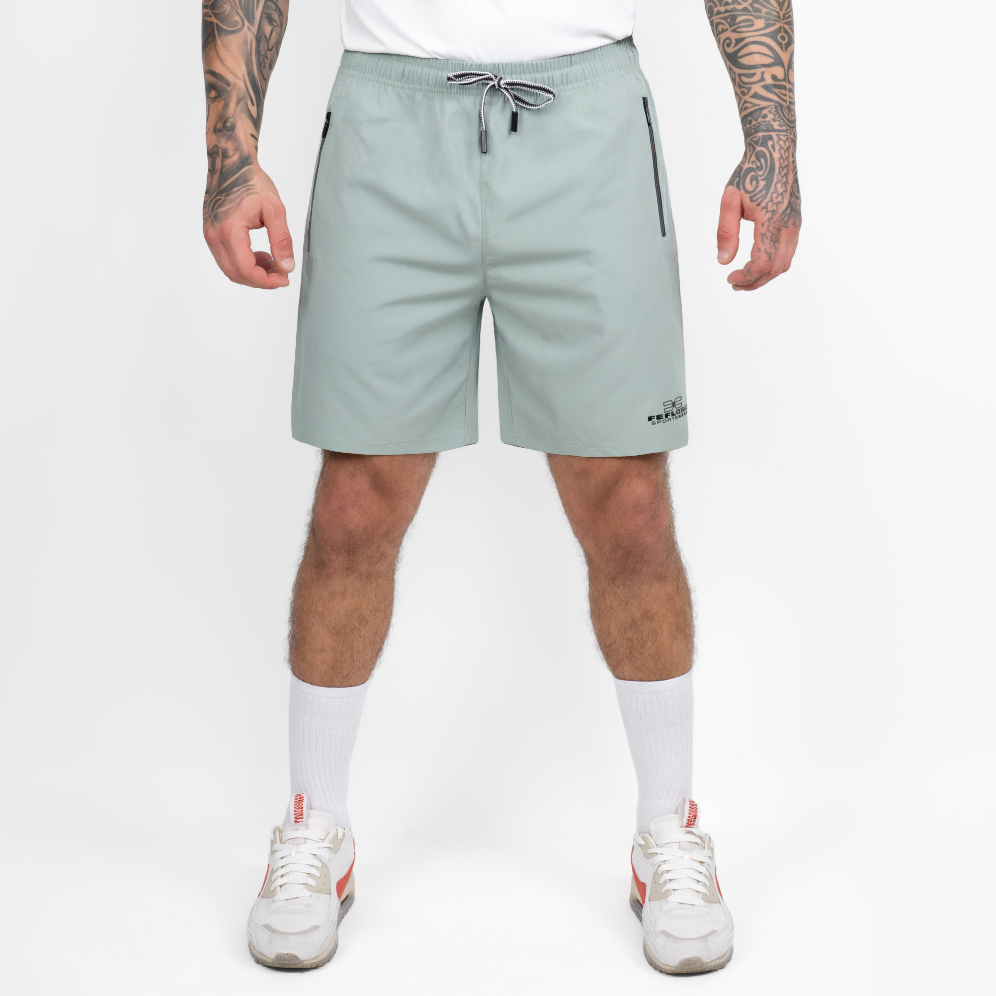 FFX Excellent Training Sport Shorts Flex Fit von FEFLOGX Sportswear, exzellente Sport Shorts, Kurze Sporthose, kurze Trainingshose, Sport Shorts Herren, kurze Jogginghose Herren in hellblau & hellgrün, vordere Ansicht, hellgrüne Sportshorts. FFX Excellent Training Sport Shorts Flex Fit