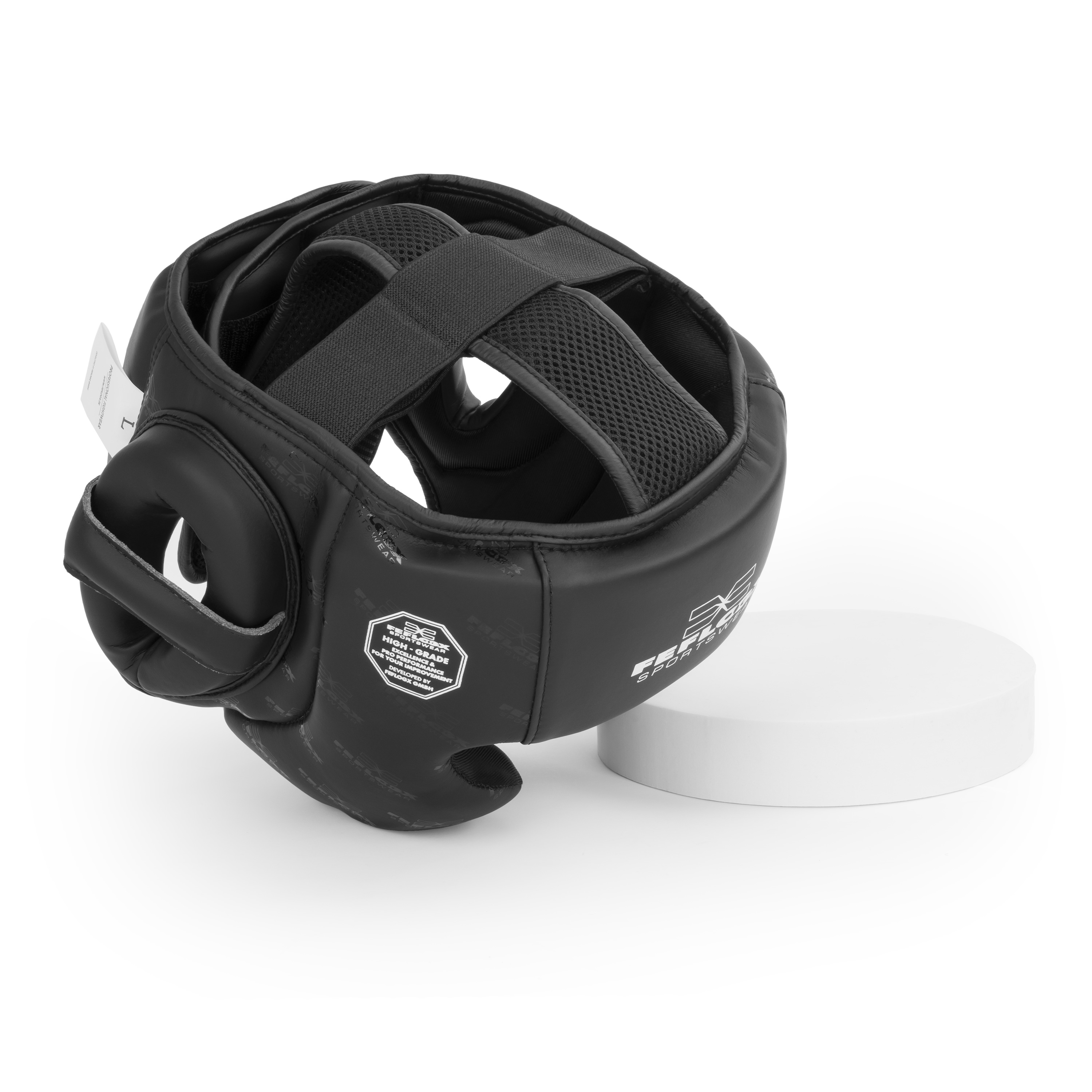 FFX Competition Kopfschutz Protection Force by FEFLOGX, Box Kopfschutz mit exzellenter Dämpfung für High-Performance, Kickbox Kopfschutz für Boxen Muay-Thai, MMA, Kickboxen, Taekwondo und vieles mehr, MMA Kopfschutz Kickboxen, schräg obere Ansicht des schwarzen Kopfschutz / Headguards. FFX Competition Kopfschutz Protection Force